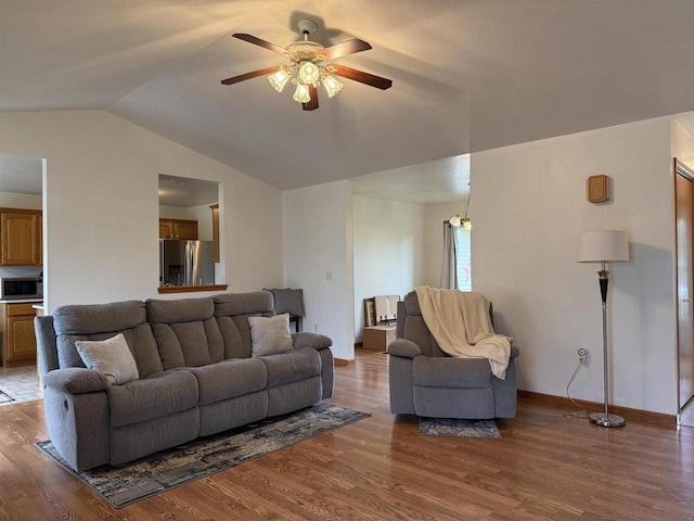 1080 Jaystone Ter, Waterloo, WI 53594 - living area with ceiling fan, lofted ceiling, wood finished floors, and baseboards