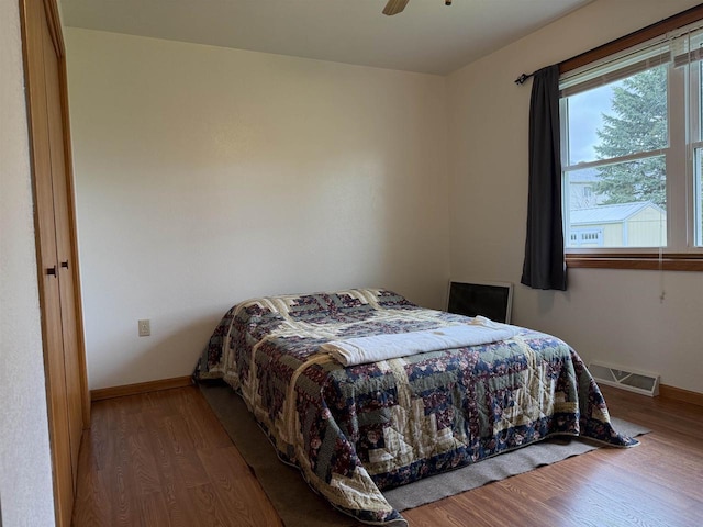1080 Jaystone Ter, Waterloo, WI 53594 - bedroom featuring wood finished floors, baseboards, and ceiling fan