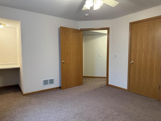 1080 Jaystone Ter, Waterloo, WI 53594 - unfurnished bedroom featuring carpet floors, baseboards, and ceiling fan