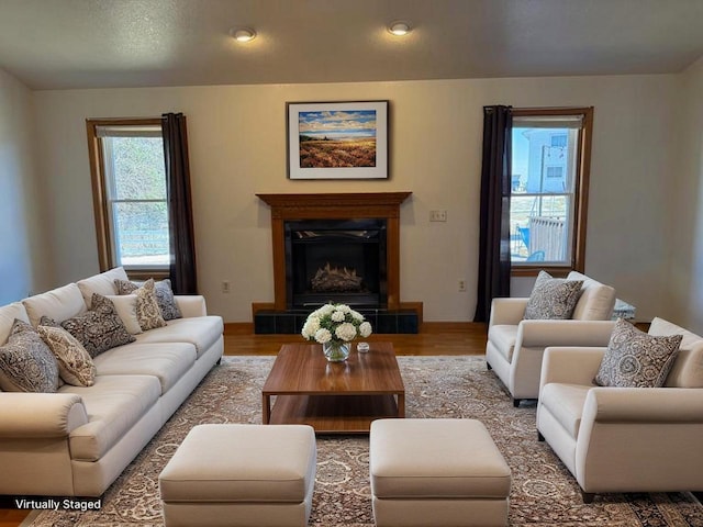 1080 Jaystone Ter, Waterloo, WI 53594 - living room with a tile fireplace, wood finished floors, and recessed lighting