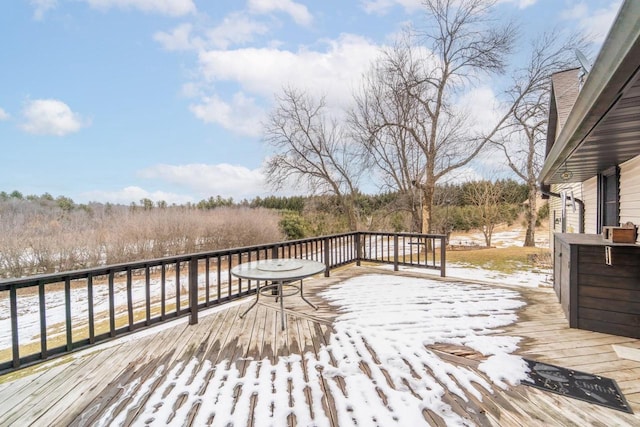 view of snow covered deck