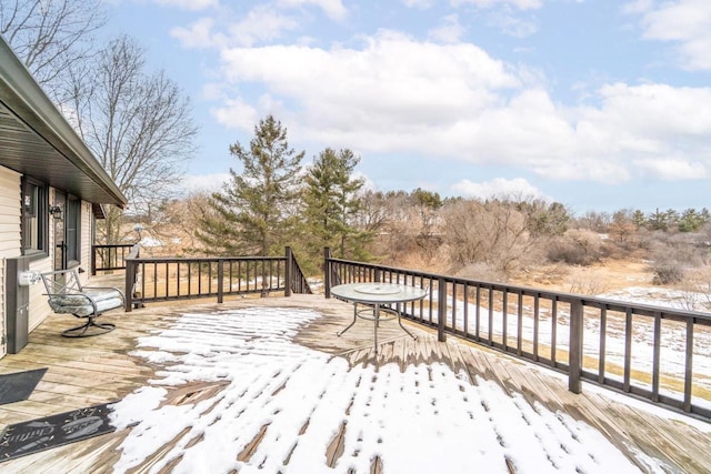 view of snow covered deck