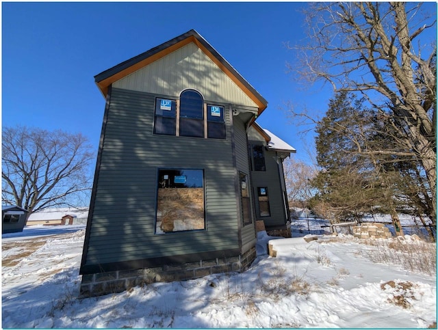 view of snow covered property