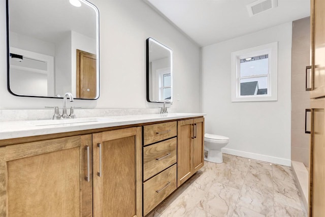 full bath with baseboards, visible vents, toilet, marble finish floor, and a sink