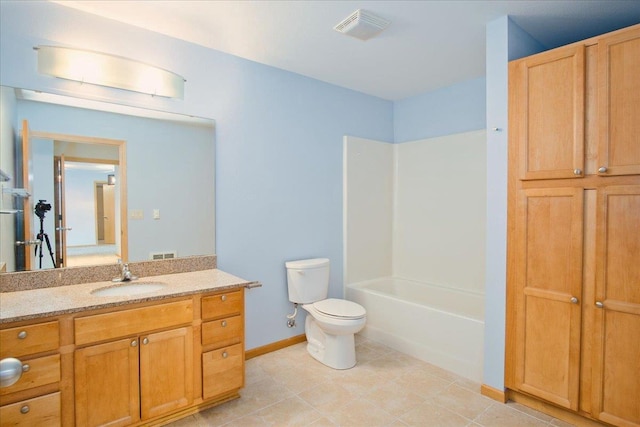 bathroom featuring toilet, tile patterned flooring, vanity, and visible vents