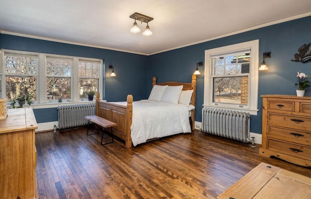 bedroom with crown molding, multiple windows, radiator, and dark wood-style floors