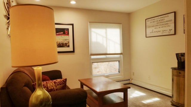 interior space with baseboards, baseboard heating, and recessed lighting