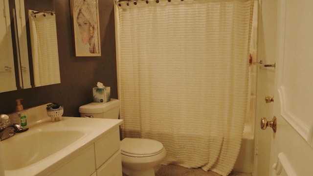 full bathroom with shower / tub combo, vanity, and toilet