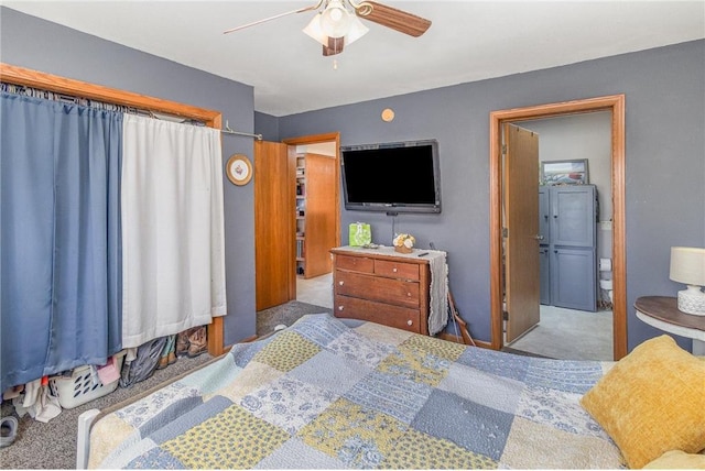 carpeted bedroom with a ceiling fan