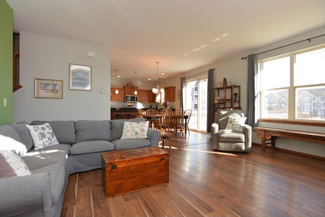 living area with dark wood-style flooring