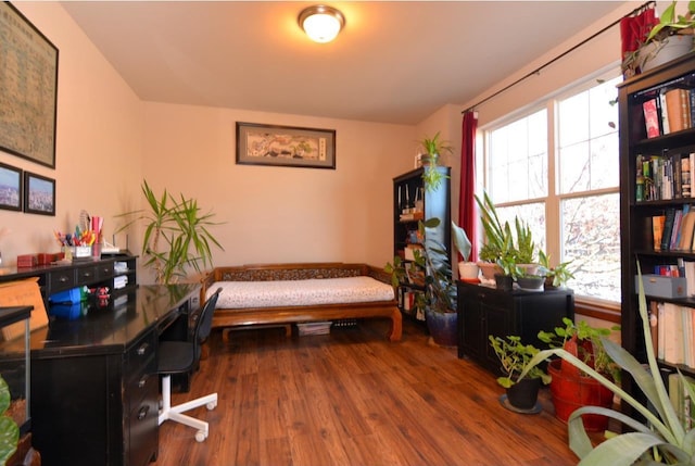 home office with wood finished floors