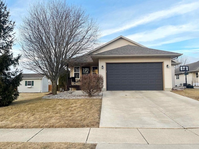 ranch-style house featuring driveway, an attached garage, a front lawn, and a shingled roof