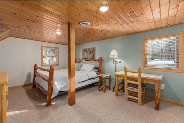 34239 Mcgraw Lake Rd, Danbury, WI 54830 - carpeted bedroom featuring lofted ceiling, wood ceiling, visible vents, and baseboards