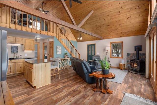 34239 Mcgraw Lake Rd, Danbury, WI 54830 - kitchen featuring dark countertops, wooden ceiling, dark wood-style floors, open floor plan, and light brown cabinets