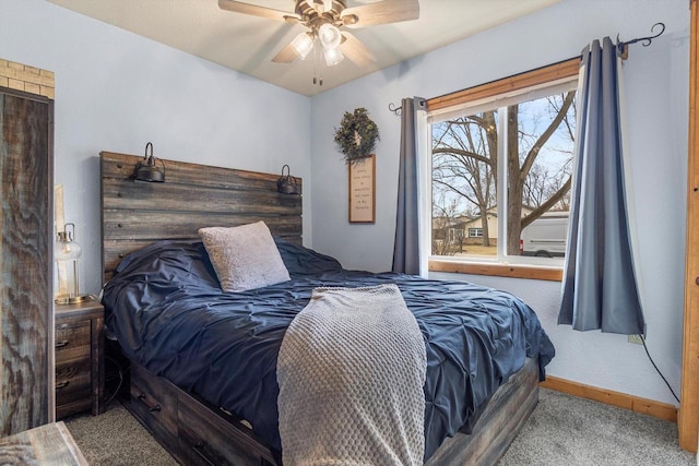 bedroom featuring ceiling fan, carpet floors, and baseboards