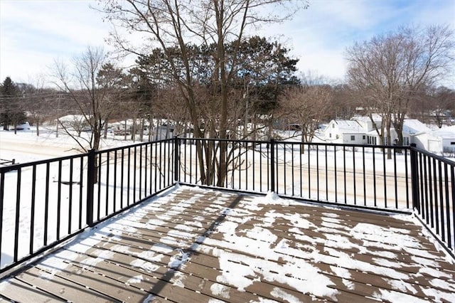 view of snow covered deck