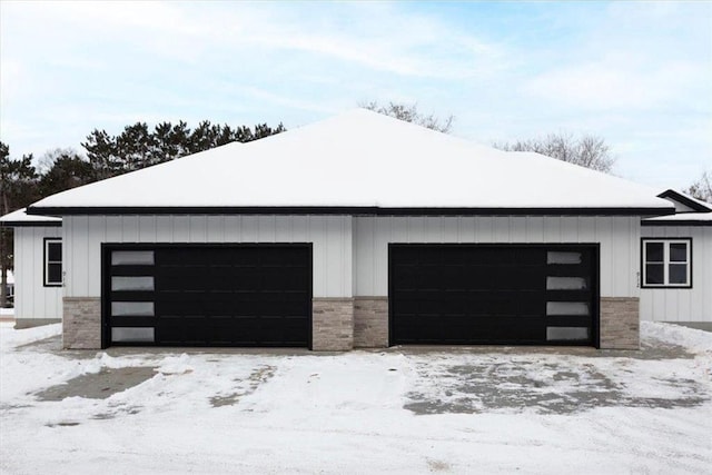 view of snow covered garage