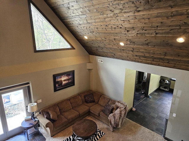 living area with a wealth of natural light, wooden ceiling, visible vents, and recessed lighting