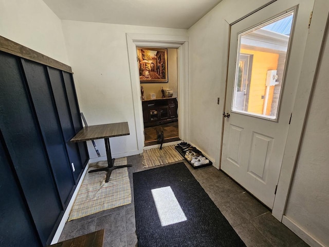 foyer entrance with baseboards