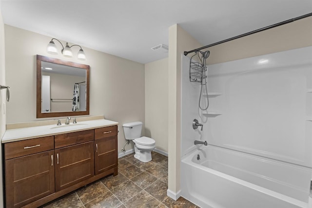 bathroom with visible vents, toilet, shower / tub combo, vanity, and baseboards