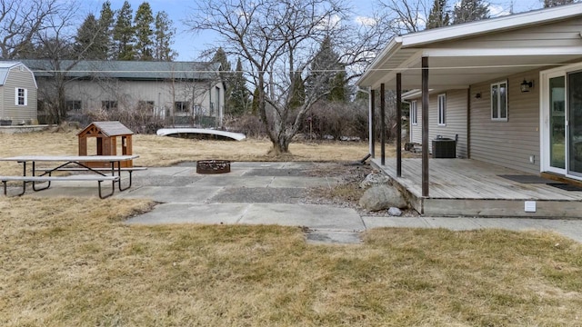 view of yard with a wooden deck