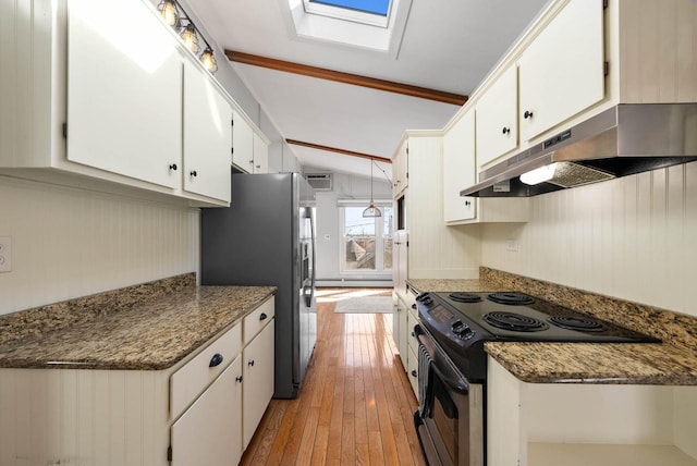 kitchen with black electric range, under cabinet range hood, stainless steel fridge, and white cabinetry