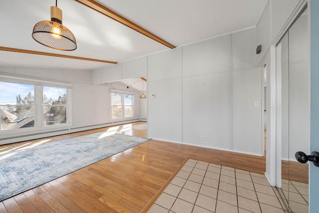 interior space with vaulted ceiling with beams, baseboard heating, and light wood-type flooring