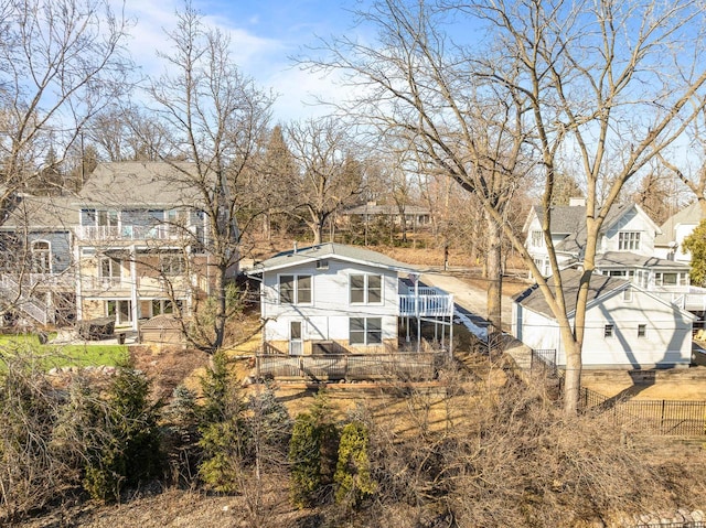 rear view of property with a residential view