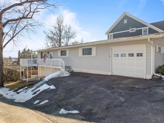 view of front of house with driveway and an attached garage