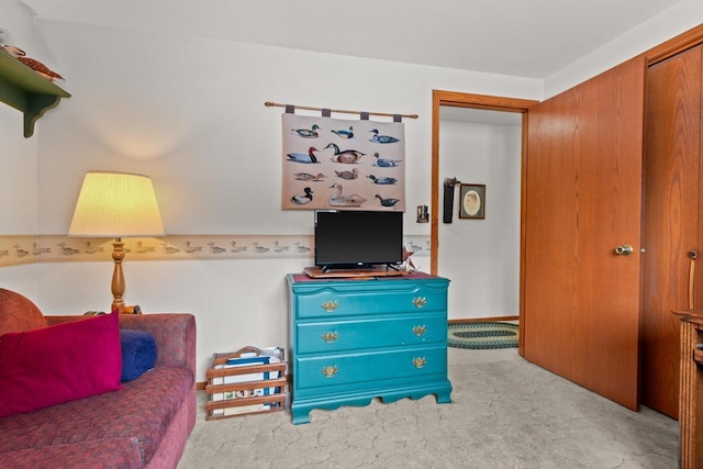 sitting room featuring carpet