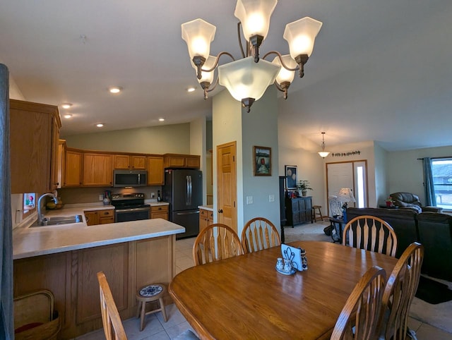 dining room with light tile patterned floors, vaulted ceiling, and recessed lighting