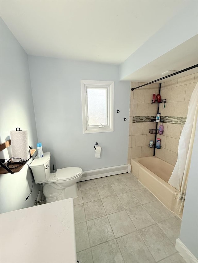 full bathroom with baseboard heating, tile patterned flooring, baseboards, and toilet