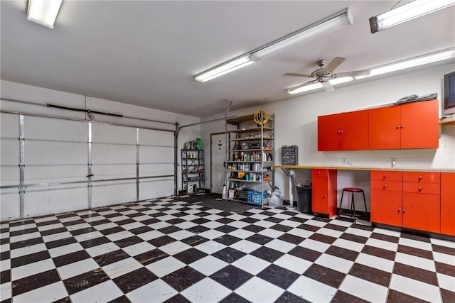 garage with a ceiling fan