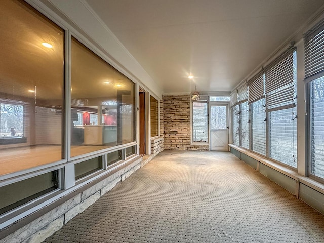 view of unfurnished sunroom