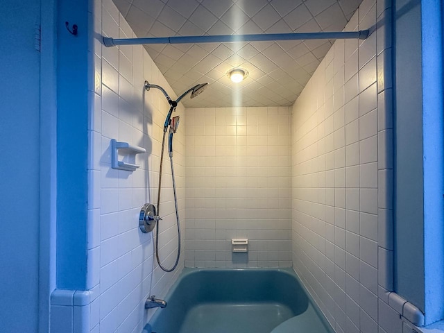 bathroom with shower / bathtub combination