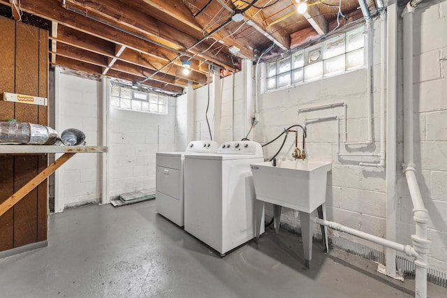 laundry area with laundry area and separate washer and dryer