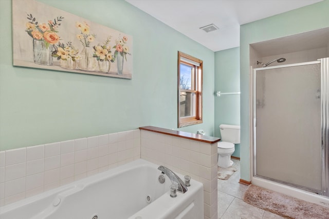 bathroom with visible vents, toilet, a stall shower, a jetted tub, and tile patterned floors