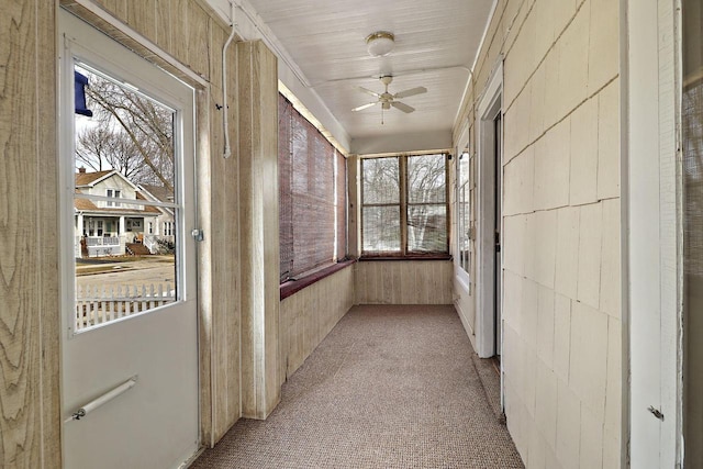 hallway with light carpet