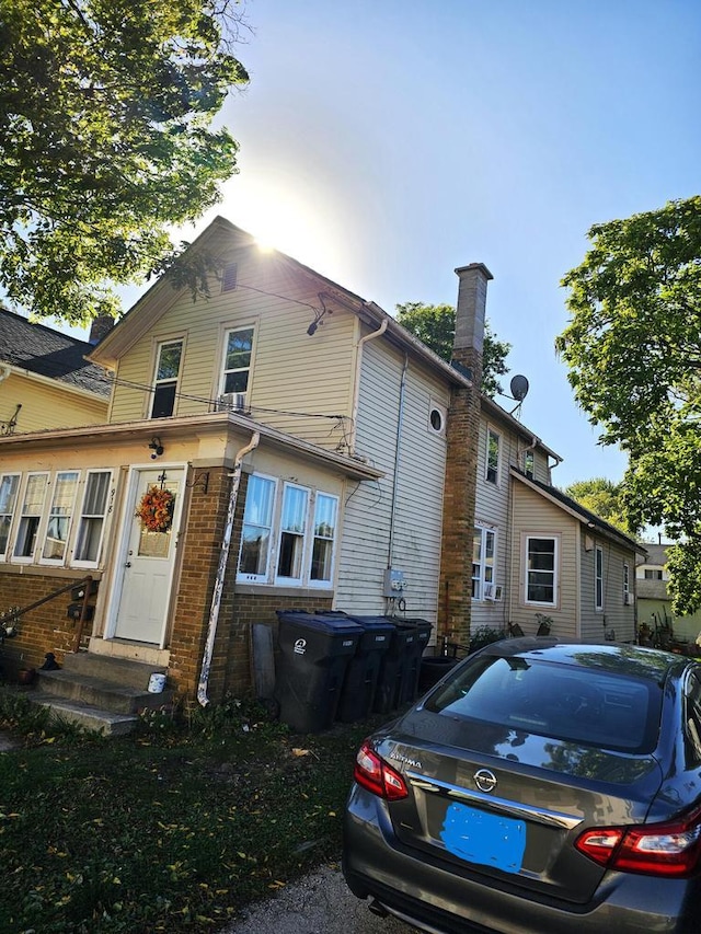 view of front facade featuring brick siding