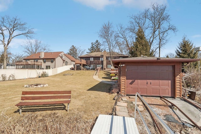 exterior space featuring a garage and fence