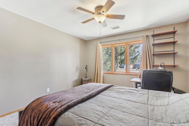 bedroom featuring baseboards, visible vents, carpet floors, and ceiling fan