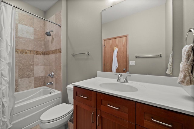 bathroom featuring toilet, vanity, and shower / bath combo