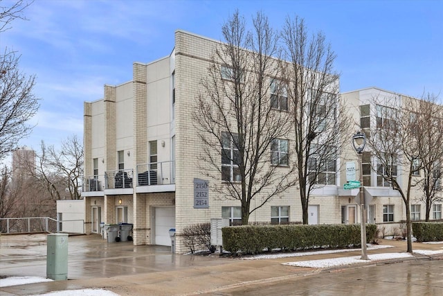 view of property featuring driveway