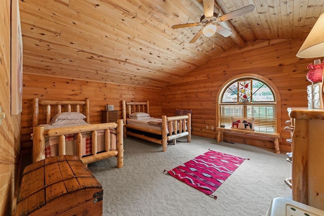 bedroom with carpet floors, lofted ceiling, wood walls, ceiling fan, and wooden ceiling