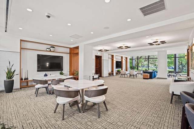 dining area featuring recessed lighting, visible vents, and light colored carpet