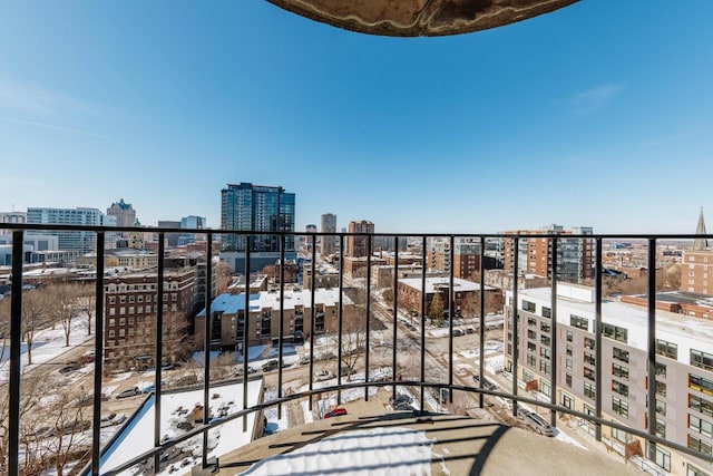 balcony featuring a city view