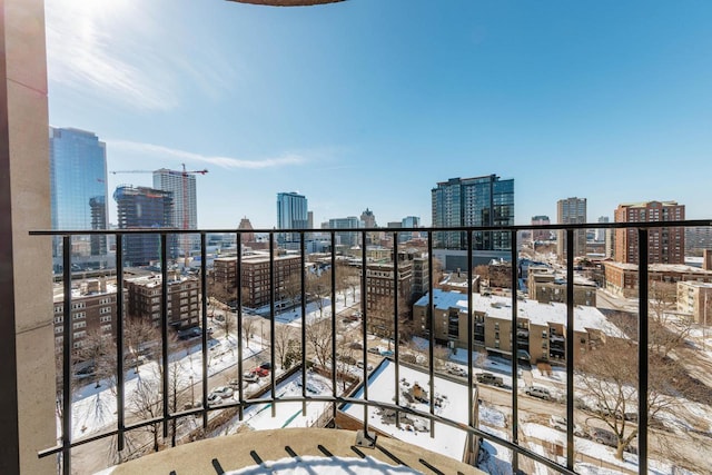 balcony featuring a city view