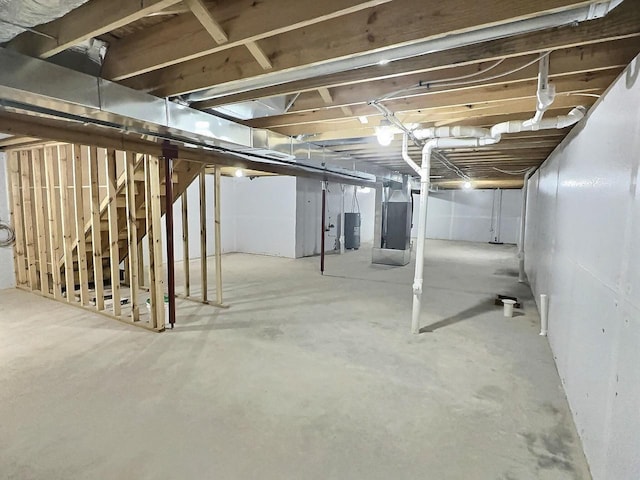 2931 Ridge View Dr, Portage, WI 53901 - unfinished basement featuring heating unit and water heater