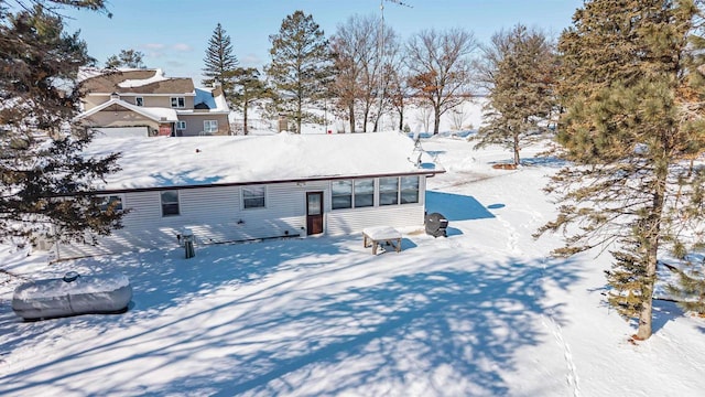 view of snow covered property