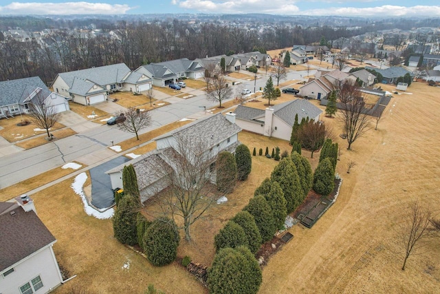 birds eye view of property with a residential view